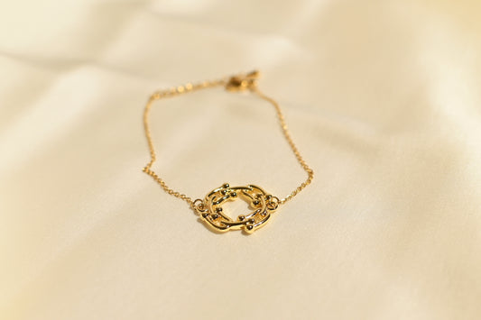 CIRCLE CUT BRACELET